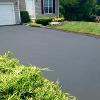 FResidential driveway after sealcoating